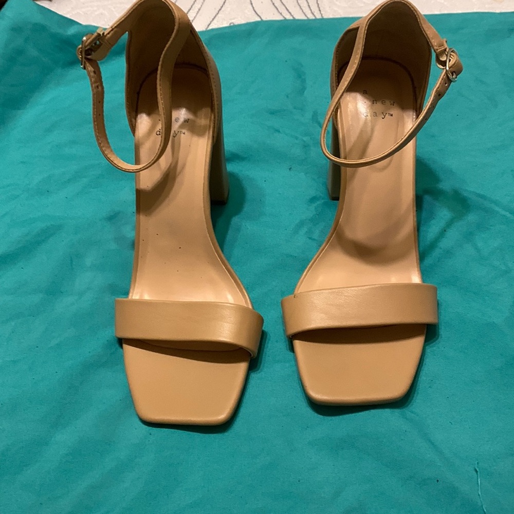 A Knew Day camel colored ankle strap heels.